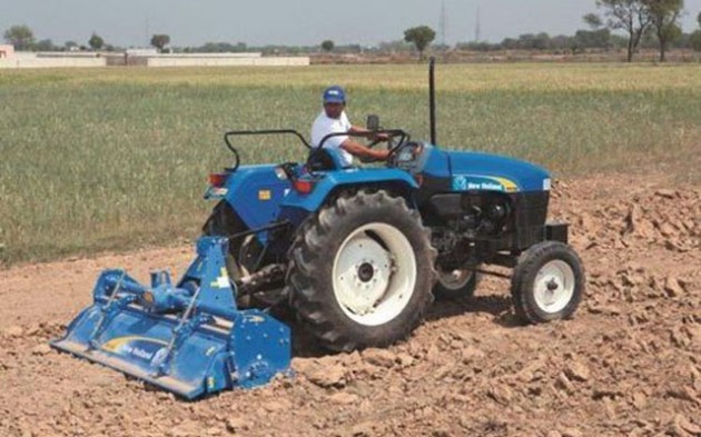 One of the three New Holland Tractors